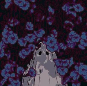 a ghost in some dark purple flowers